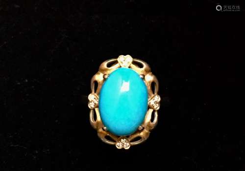 A gilt silver turquoise ring marked