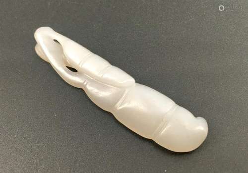 A white jade carved bean form pendant