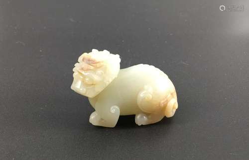 A white jade carved figure of beast