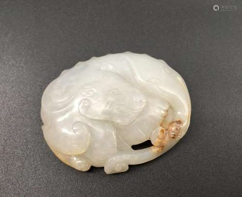 A white jade carved figure of beast