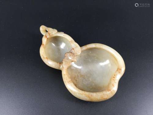 A nice carved white jade washer
