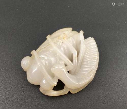 A white jade carved ornament