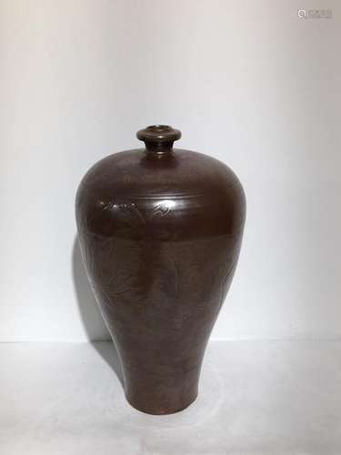 A rare underglazed brown carved flower meiping; Qing or