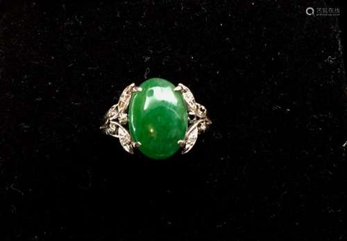 A white gold/diamond inlaid jadeite ring