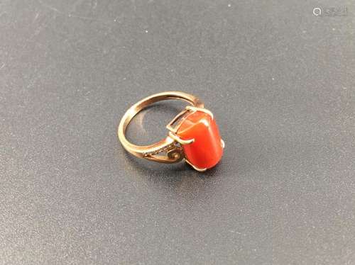 A red coral/diamonds lady ring