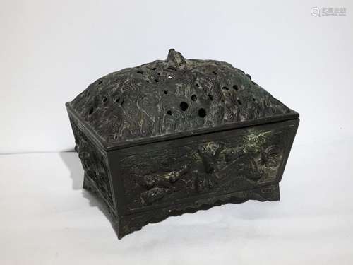 A low relief carved bronze censer