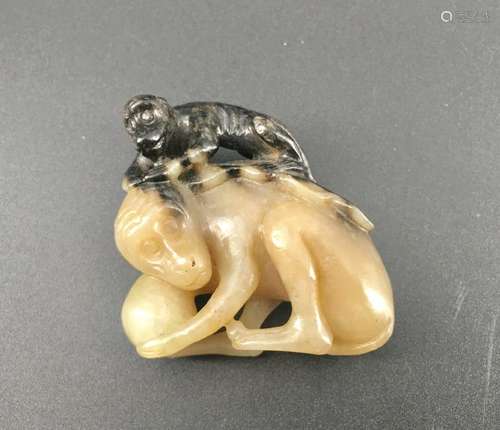 A nice carved  double colour jade ornament, monkeys