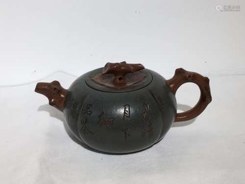 A 20th C. green clay zisha tea pot