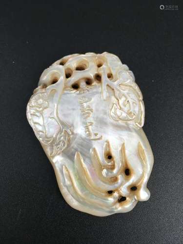 A mother of pearl carved Buddha hand form plaque