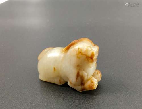 A white jade carved beast figure