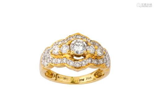 A gold and diamond dress ring