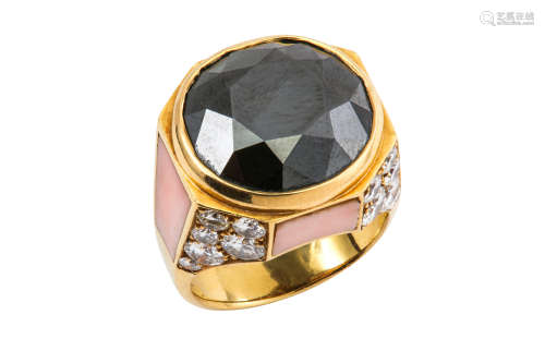 A black diamond, diamond and coral dress ring