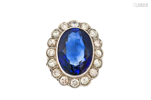 A synthetic sapphire and diamond ring