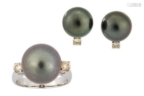 A cultured pearl and diamond ring and earstuds