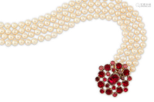 A cultured pearl necklace with a 19th century garnet clasp