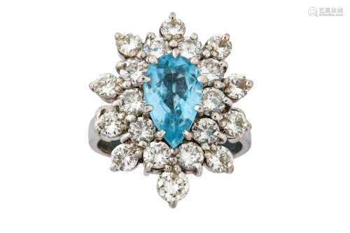 A diamond and blue topaz cluster ring