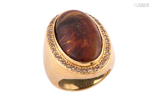 A fire agate and diamond ring
