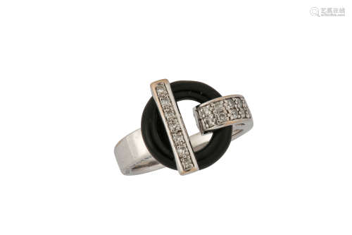 An onyx and diamond ring, by Guy Laroche