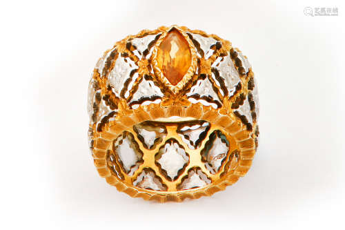 An orange sapphire-set ring, by Mario Buccellati