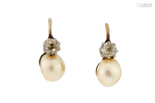 A pair of pearl and diamond earrings