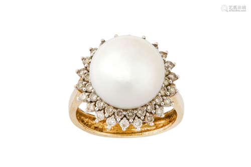 A cultured pearl and diamond ring