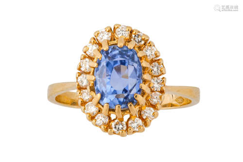 A sapphire and diamond cluster ring
