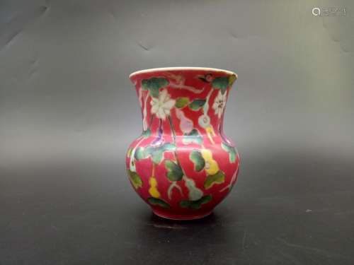 A Carmine Red Ground Famille Rose Bucket Vase