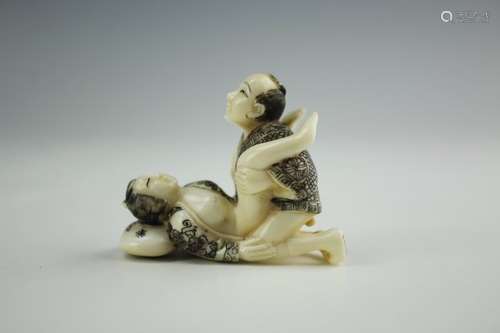 Carved Cattle Bone of Erotic Netsuke Woman on her Back