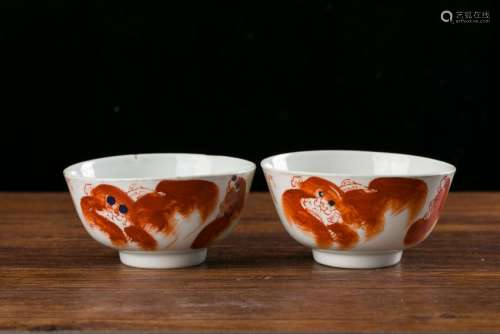 A Pair of Copper Red Lions Bowls