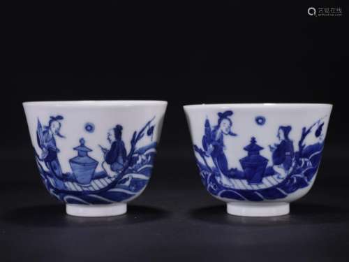 A Pair of Blue and White Storied Cups