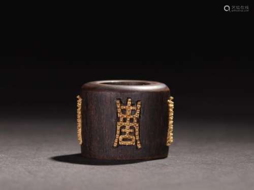 An Agarwood Chenxiang Archery Ring with Gold Longevity