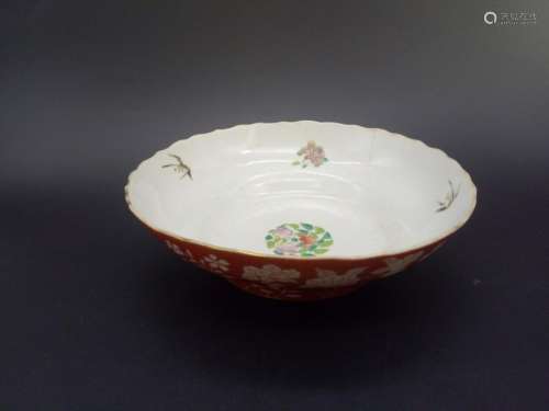 A Famille Rose Plate with Iron Red Ground Daoguang Mark