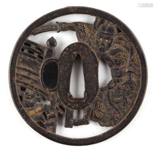 Property of a gentleman - a Japanese gold inlaid iron tsuba, 19th century or earlier, decorated with