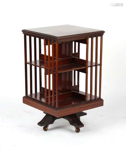 Property of a deceased estate - an Edwardian mahogany revolving bookcase, 33ins. (84cms.) high (