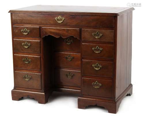 Property of a deceased estate - an 18th century George III mahogany kneehole desk with an