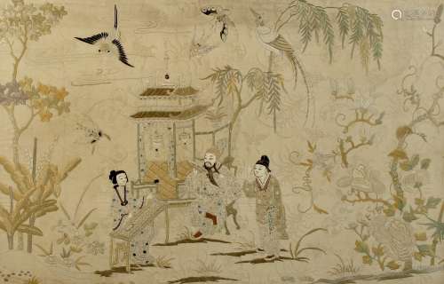 A late 19th / early 20th century Chinese embroidered silk panel depicting three figures in garden