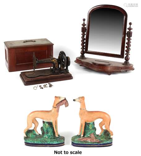 Property of a gentleman - a pair of Victorian Staffordshire figures of greyhounds with hares;