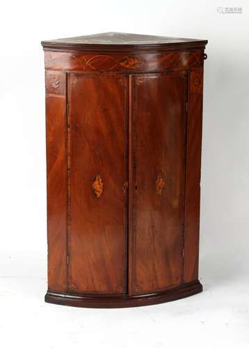 Property of a gentleman - a George III mahogany & inlaid bow-fronted two-door corner wall cabinet,