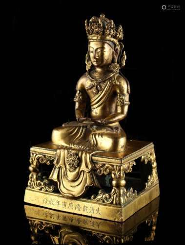 A Chinese gilt bronze figure of Amitayus modelled seated in dhyanasana on a rectangular throne