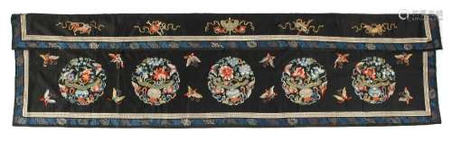 A Chinese embroidered silk table apron, early 20th century, with butterflies & vases of flowers in