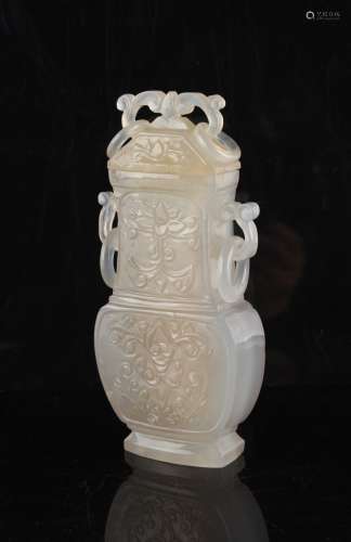 A Chinese carved agate baluster vase & cover of rectangular section with ring handles, probably