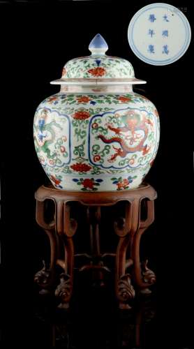 Property of a lady - a Chinese wucai ovoid ginger jar & cover, painted with four panels of