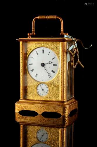 Property of a gentleman - a late 19th century French gilt brass cased carriage clock with alarm &