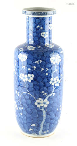 Property of a gentleman - a 19th century Chinese blue & white rouleau vase, decorated with prunus on