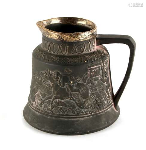 Property of a deceased estate - an early Macintyre black pottery bell shaped jug, decorated in