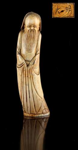 A Chinese carved ivory figure of a standing scholar, 19th century, incised 2-character mark to base,