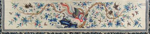 An early 20th century Chinese embroidered silk panel depicting a phoenix, birds & butterflies around