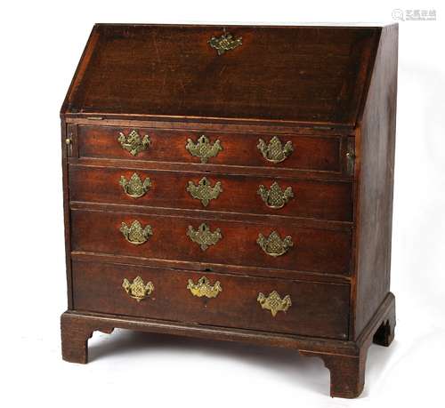 Property of a gentleman - a George III oak fall-front bureau, with four long graduated drawers, on