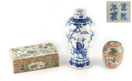 A 19th century Chinese blue & white porcelain baluster vase, painted with four alternating panels of