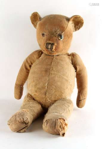 Property of a gentleman - an antique & well-loved teddy bear, straw filled, 22.5ins. (57cms.)